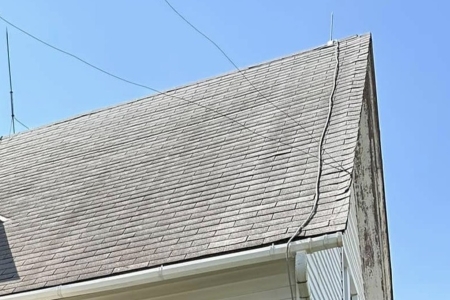 How Winter Damages Roofs in Central Illinois (And Why Spring Roof Cleaning Matters) Thumbnail
